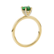 Side view of a yellow gold heart gemstone solitaire ring showing the brilliant diamond pavé basket.