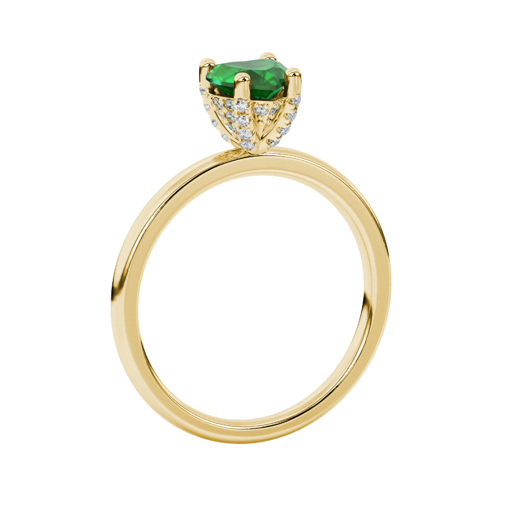 Side view of a yellow gold heart gemstone solitaire ring showing the brilliant diamond pavé basket.