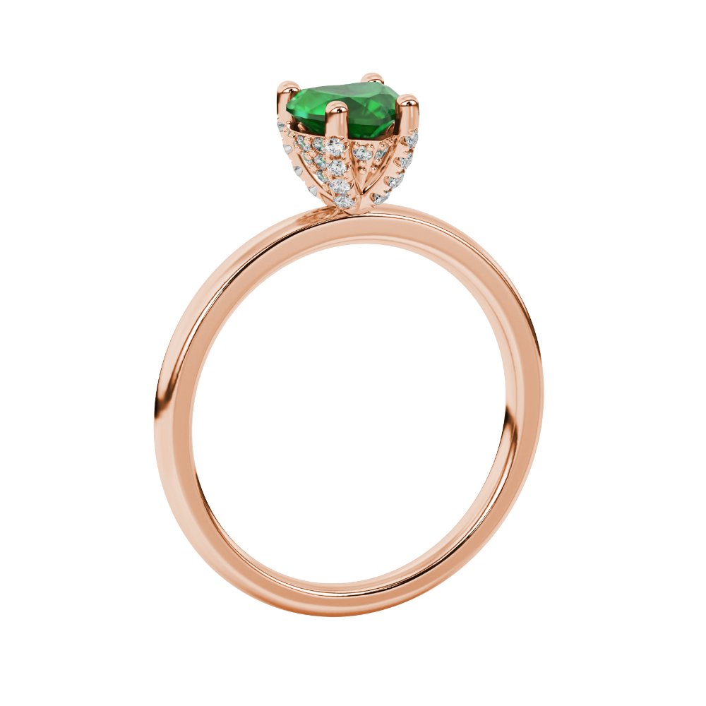 Side profile of a rose gold heart gemstone ring showing the hidden diamond pavé basket gallery.