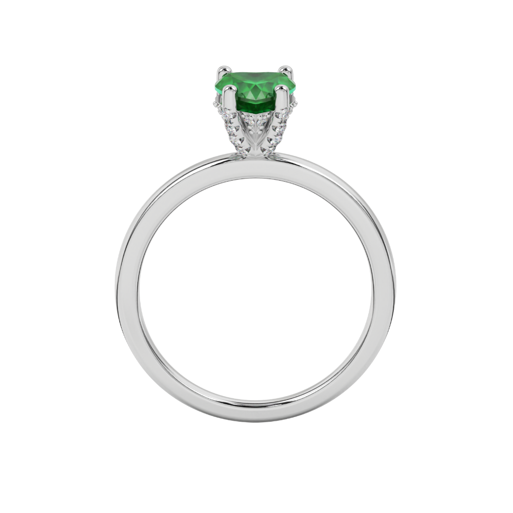 Heart-cut emerald green gemstone solitaire ring in a white gold