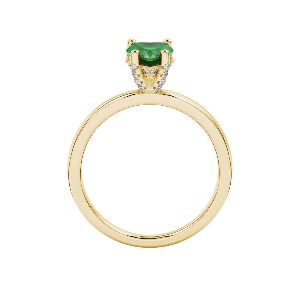 Heart-cut emerald green gemstone solitaire ring in a yellow gold four-prong setting.