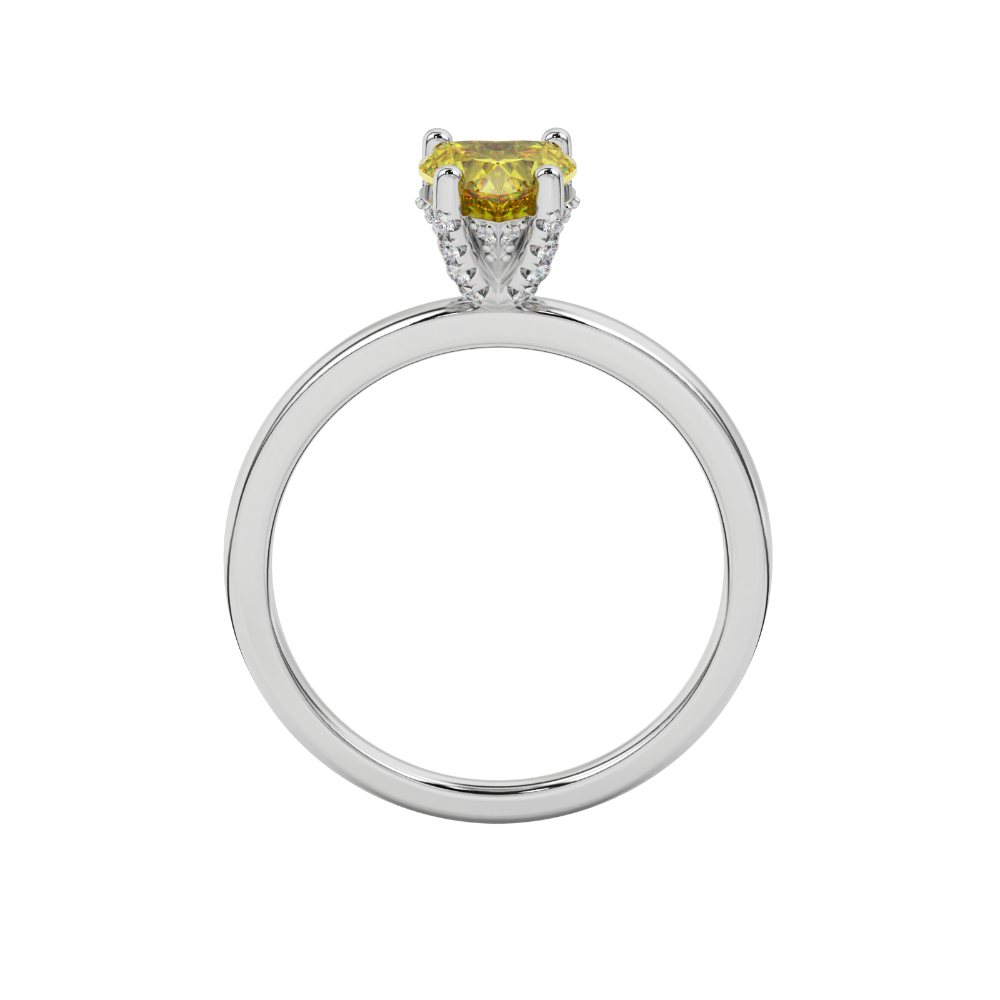 Heart-cut canary yellow gemstone solitaire ring in a white gold four-prong setting.