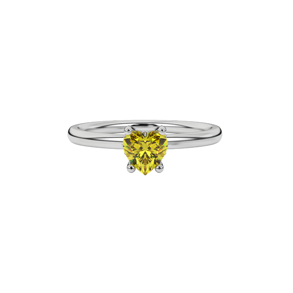 close-up of a heart-shaped canary yellow solitaire gemstone in a white gold four-prong setting.