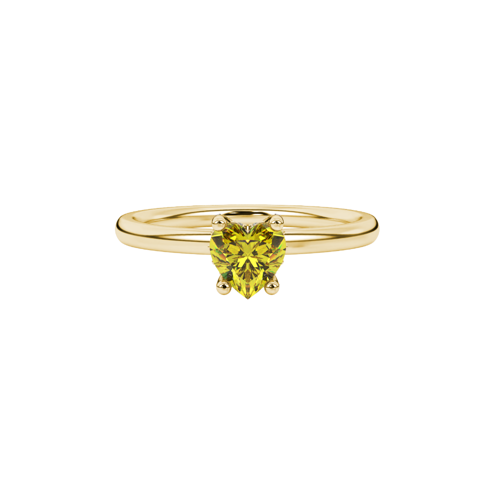 Close-up details of a heart-shaped canary yellow gemstone with a hidden diamond pavé basket in yellow gold.