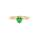 close-up of a heart-shaped emerald green gemstone secured in a yellow gold