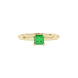 Close-up, princess emerald green gemstone, yellow gold four-prong ring.