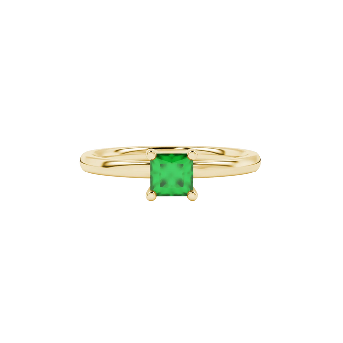 Close-up, princess emerald green gemstone, yellow gold four-prong ring.