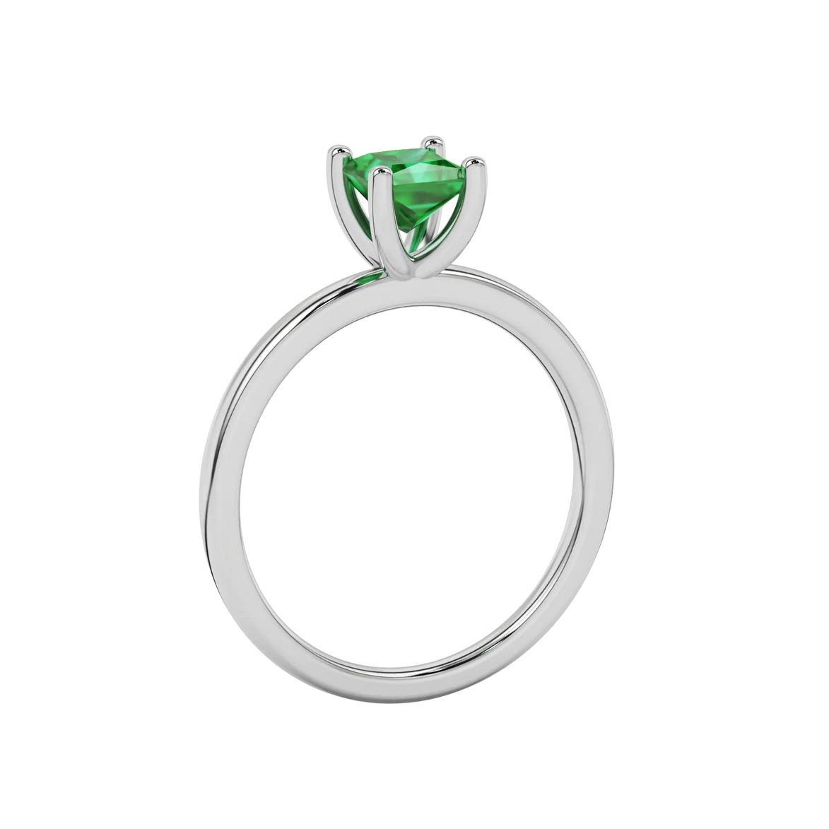 Side profile, white gold emerald green ring, four-prong gallery.