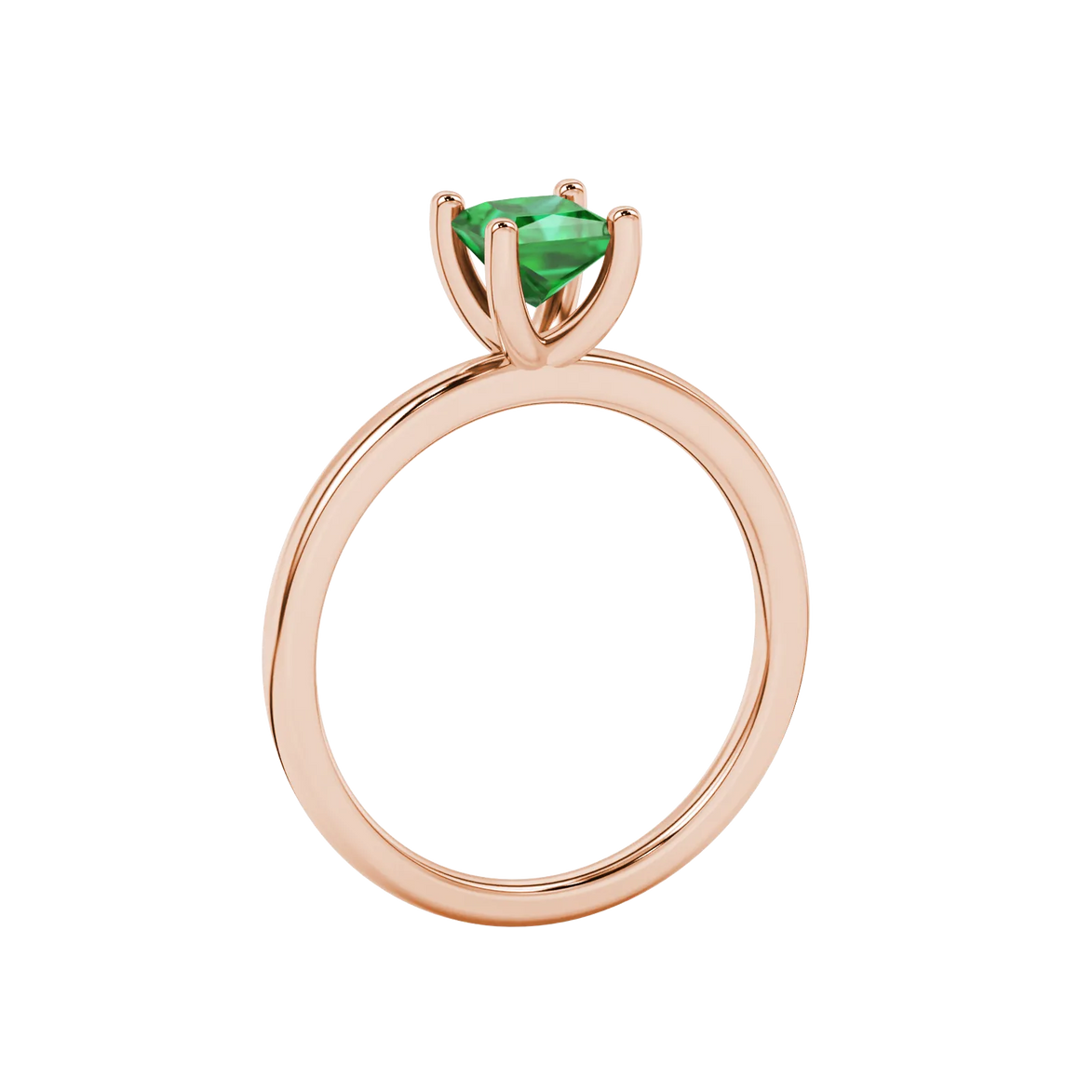 Side profile, rose gold emerald green ring, four-prong gallery.