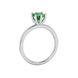 Side profile, white gold emerald green ring, six-prong gallery.