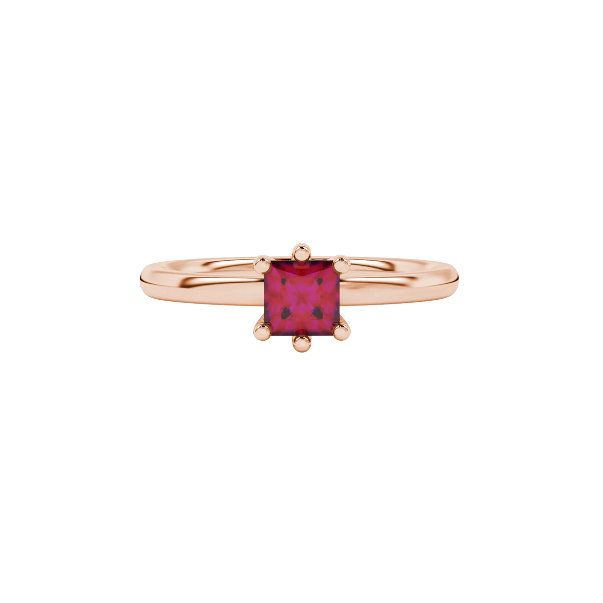 Close-up, princess raspberry red gemstone ring, rose gold six-prong setting.