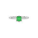 Close-up emerald green gemstone ring, white gold six-prong setting.