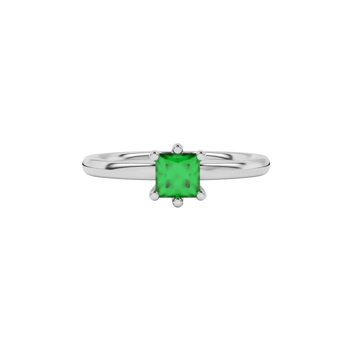 Close-up emerald green gemstone ring, white gold six-prong setting.