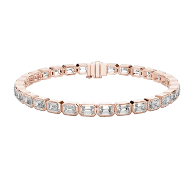 Rose gold bracelet with diamond accents on a white background
