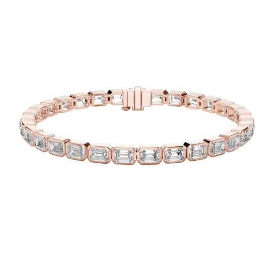 Rose gold bracelet with diamond accents on a white background