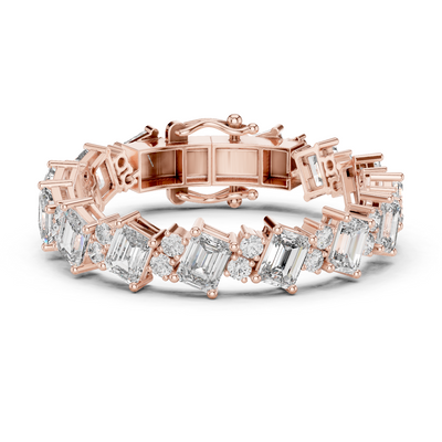 Luxury emerald cut diamond tennis bracelet in gold with round accent diamonds by Signora Jewels