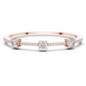 Elegant three stone round diamond bangle bracelet in gold with pavé accent diamonds by Signora Jewels