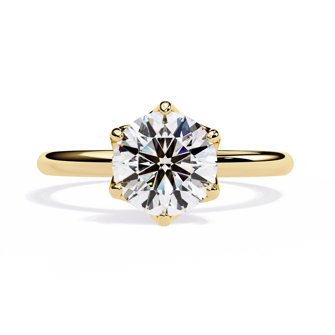 Gold ring with a large diamond on a white background