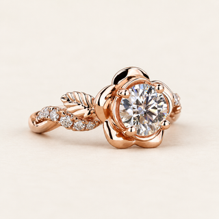 Round Lab Grown Diamond floral engagement ring in rose gold with a six-petal flower basket and leaf pavé shoulders.