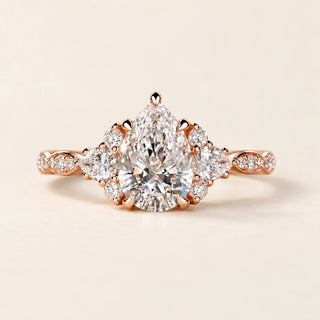 Pear Cut Lab Grown Diamond Three-Stone Engagement Ring in Rose Gold