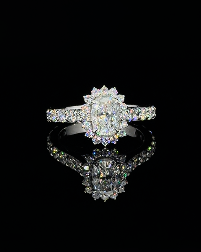 Main: White gold 1.02ct cushion halo ring with pave lab grown diamond accents on black
Detail: Close-up of 1.02ct cushion lab grown diamond in a white gold scalloped halo setting
Side: White gold cushion halo ring with lab grown diamond pave shoulders and raised prong profile