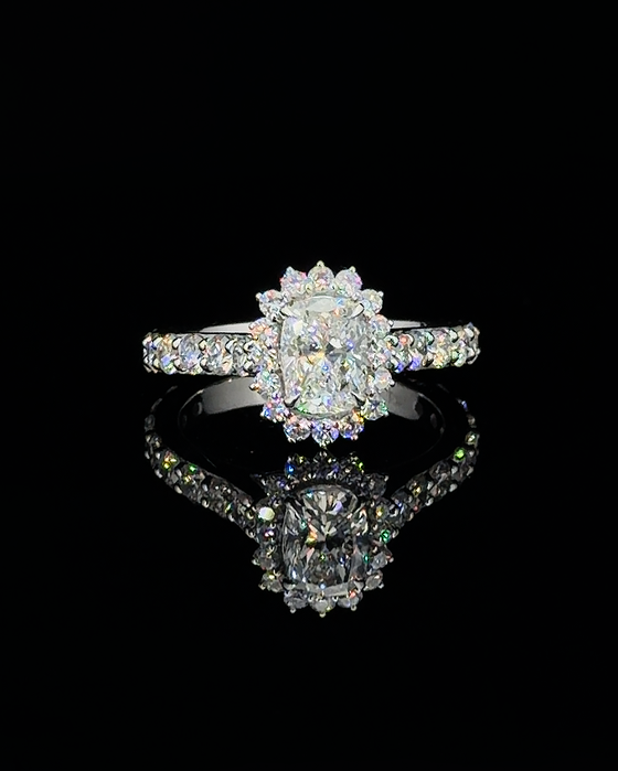 Main: White gold 1.02ct cushion halo ring with pave lab grown diamond accents on black
Detail: Close-up of 1.02ct cushion lab grown diamond in a white gold scalloped halo setting
Side: White gold cushion halo ring with lab grown diamond pave shoulders and raised prong profile