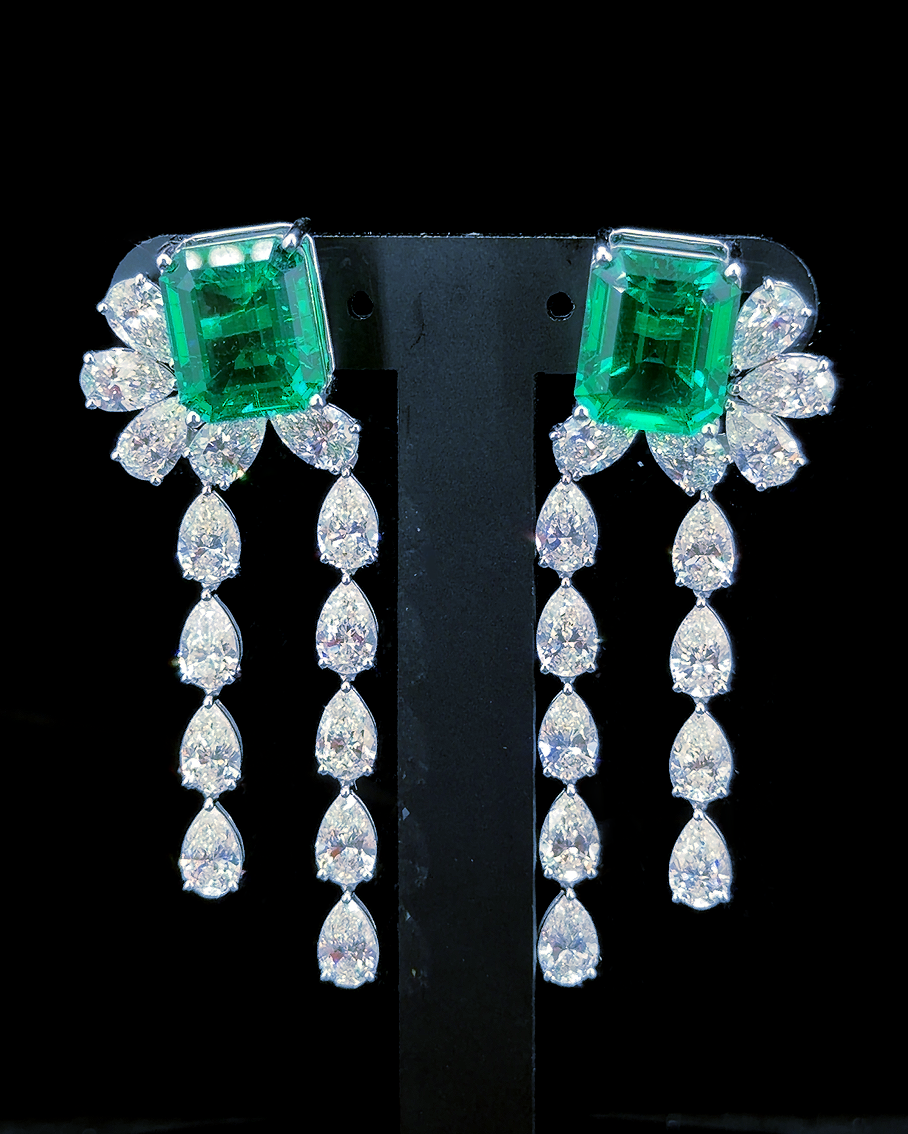 White gold green gemstone earrings with cascading pear lab grown diamonds on black