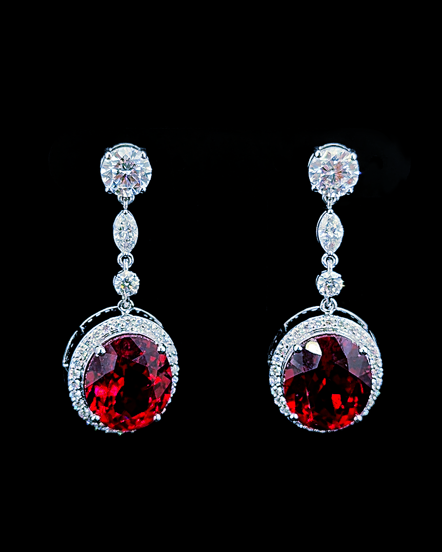 White gold red oval birthstone drop earrings with lab grown diamond halos on black