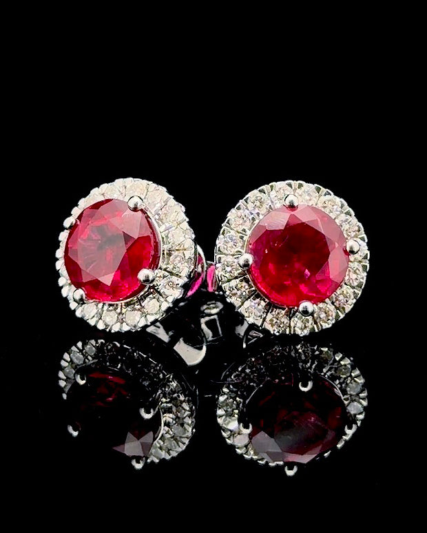 White gold red round birthstone stud earrings with lab grown diamond halos on black