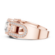 Rose gold ring with diamond accents on a white background
