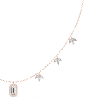emerald and marquise diamond halo pendant in rose gold
