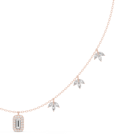 emerald and marquise diamond halo pendant in rose gold