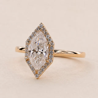 Dutch Marquise cut lab grown diamond halo engagement ring in 18K yellow gold with six-prong setting and plain comfort-fit band.
