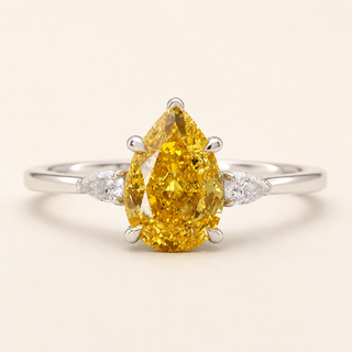 Pear Intense Yellow Lab Grown Diamond Three-Stone Engagement Ring with Trillion Side Diamonds in White Gold