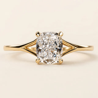 Elongated cushion Lab Grown Diamond solitaire engagement ring in yellow gold with a split cathedral shank and four-prong open basket.