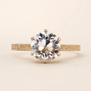 Old European cut Lab Grown Diamond vintage engagement ring in yellow gold with a six-prong lotus basket and engraved milgrain band.