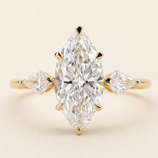 Marquise Cut Lab Grown Diamond Three-Stone Engagement Ring with Kite Side Diamonds in Yellow Gold