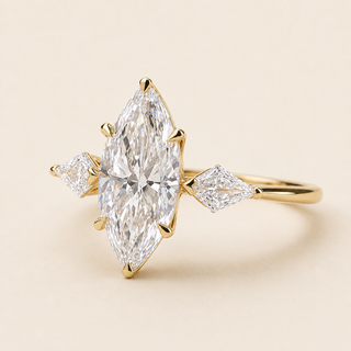Marquise Cut Lab Grown Diamond Three-Stone Engagement Ring with Kite Side Diamonds in Yellow Gold