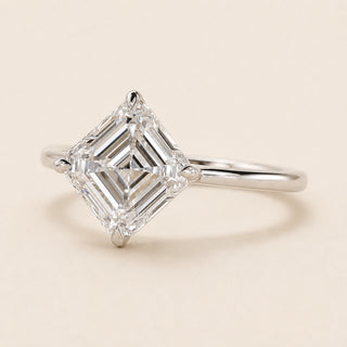 Asscher cut Lab Grown Diamond compass engagement ring in white gold with a four-prong cathedral basket and open gallery.