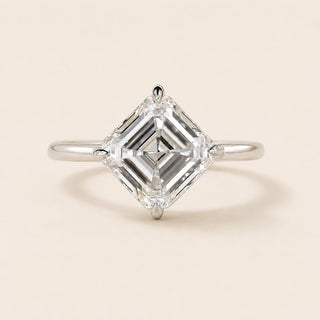 Asscher cut Lab Grown Diamond compass engagement ring in white gold with a four-prong cathedral basket and open gallery.