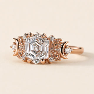 Hexagon step cut Lab Grown Diamond vintage engagement ring in rose gold with Art Deco side galleries and round diamond accents.