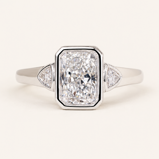 Radiant Cut Lab Grown Diamond Bezel Engagement Ring with Trillion Side Diamonds in White Gold