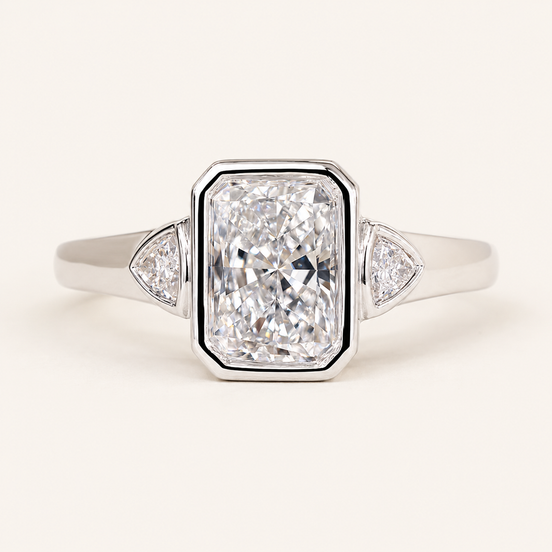 Radiant Cut Lab Grown Diamond Bezel Engagement Ring with Trillion Side Diamonds in White Gold