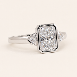 Radiant Cut Lab Grown Diamond Bezel Engagement Ring with Trillion Side Diamonds in White Gold