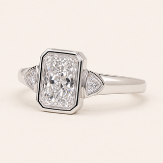 Radiant Cut Lab Grown Diamond Bezel Engagement Ring with Trillion Side Diamonds in White Gold