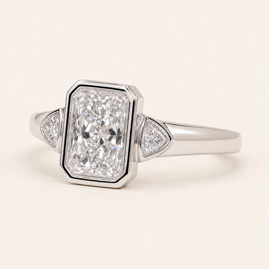 Radiant Cut Lab Grown Diamond Bezel Engagement Ring with Trillion Side Diamonds in White Gold