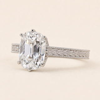 Cushion Old Mine Cut Lab Grown Diamond vintage engagement ring in white gold with an eight-prong cathedral basket, engraved split shoulders and milgrain detailing.