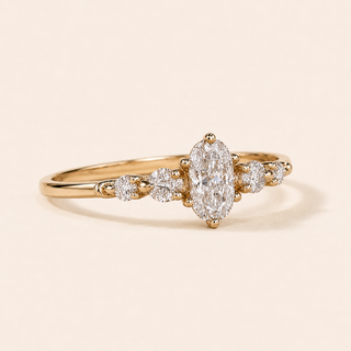 Aurora Oval Lab Grown Diamond Five-Stone Engagement Ring with Graduated Shared Prong Setting in Yellow Gold