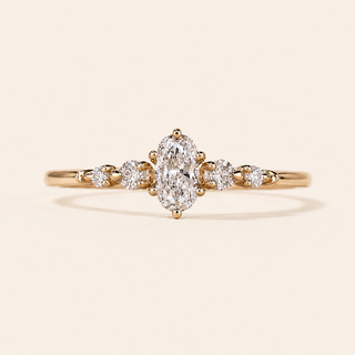 Aurora Oval Lab Grown Diamond Five-Stone Engagement Ring with Graduated Shared Prong Setting in Yellow Gold