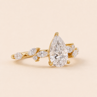 Willow Pear Lab Grown Diamond Nature Engagement Ring with Marquise & Round Leaf Clusters in Yellow Gold